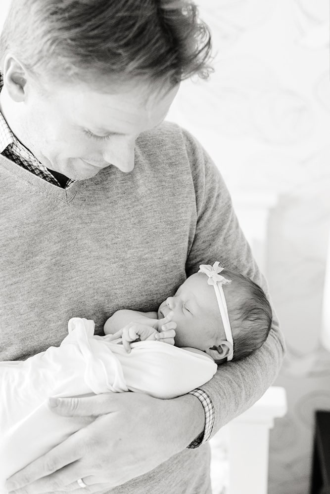 Houston newborn photographer- Dad with baby